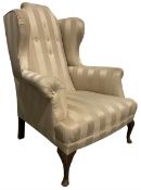 Victorian wingback armchair upholstered in later fabric