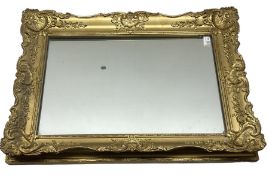 Gilt framed wall mirror