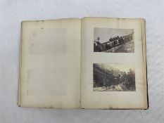 Album of British and European topographic photographs together with quantity of reference books on a