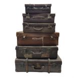 Six vintage suitcases