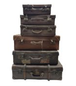 Six vintage suitcases