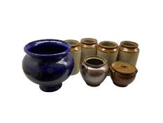 Four cylindrical stoneware jars H30cm