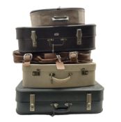 Five vintage suitcases