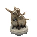 Royal Copenhagen squirrel group with nut on ornate base