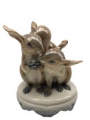 Royal Copenhagen squirrel group with nut on ornate base