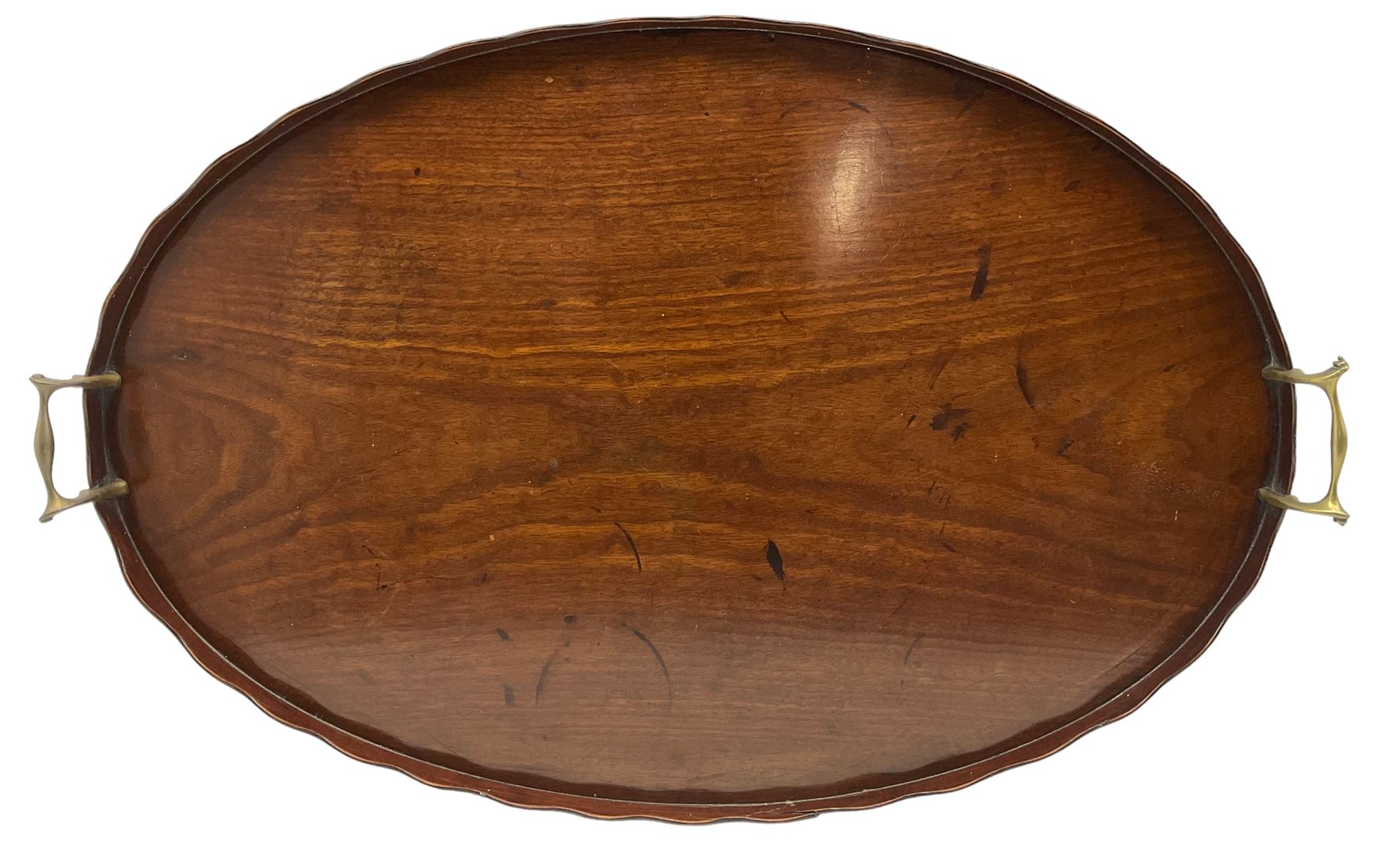 Edwardian mahogany oval tray with galleried border and brass handles W68cm