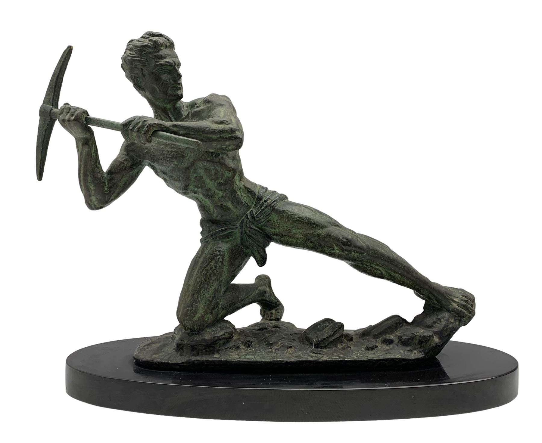 French Art Deco sculpture of miner with pick axe upon naturalistic base mounted on onyx plinth W54cm