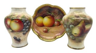 Matched pair of Royal Worcester baluster form vases by Gerald Delaney and Roberts