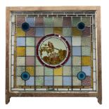Late Victorian large stained and leaded glass window panel with a circular centre panel of a bird o