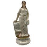19th century Staffordshire figure depicting 'Protestantism' modelled as a woman holding a bible