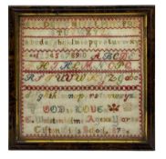 Late 19th century needlework sampler with alphabet with a decorative border by G.Wolstenhelms Age 12