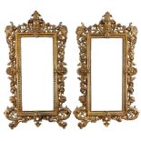 Pair of Victorian patinated cast iron wall mirrors