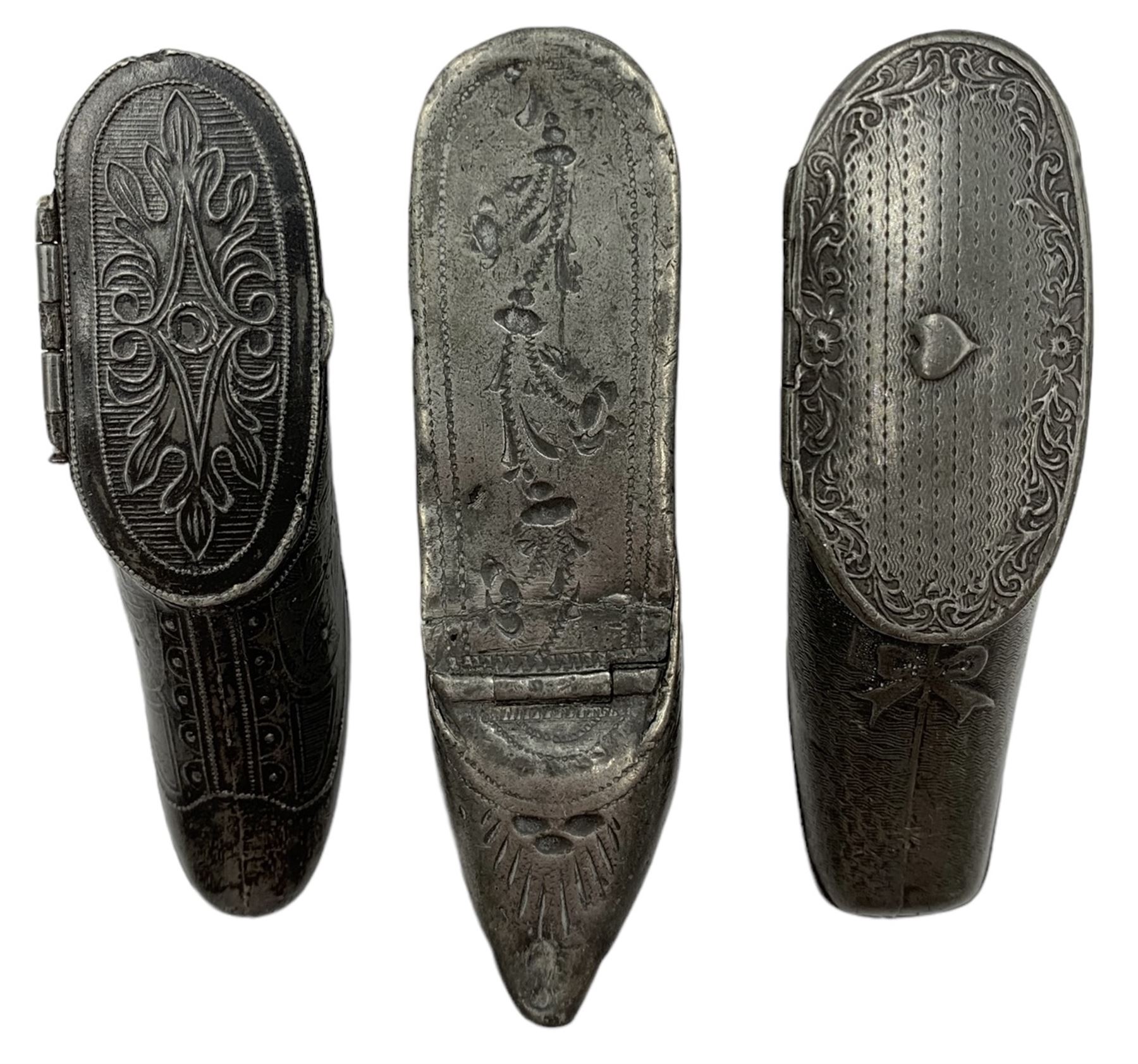 Three 19th century pewter snuff boxes in the form of shoes