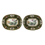 Pair of Victorian Ashworth Bros Ironstone meat plates decorated in the 'Trophy' pattern on green gro