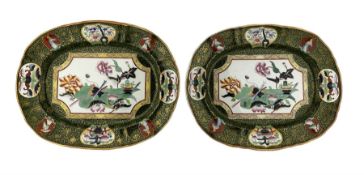 Pair of Victorian Ashworth Bros Ironstone meat plates decorated in the 'Trophy' pattern on green gro