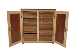 Entomology: 20th century twenty-four drawer collectors cabinet containing an assortment of beetle