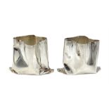 Pair of novelty silver vases by Rebecca Joselyn modelled as crumpled bags