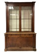 George III oak bookcase on cupboard