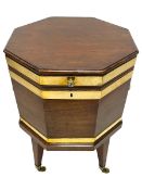 George III mahogany and brass bound octagonal cellarette on stand