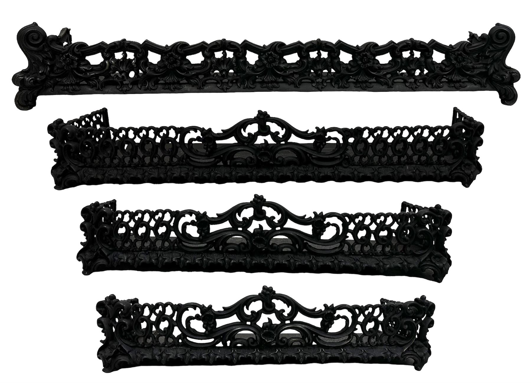 Three Victorian design graduated cast iron fire fenders