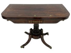 Regency rosewood and brass inlaid card table