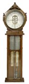 A carved oak �Royal Polytechnic Barometer� manufactured by Joseph Davis & Co