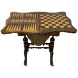 19th century figured walnut games table