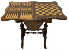 19th century figured walnut games table