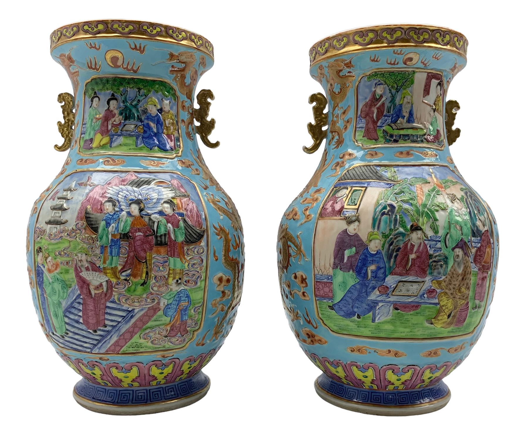 Pair of Chinese Canton Famille Rose twin handled vases