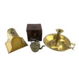 Victorian brass money box of bell form with swing brass handle and applied foliate plaque W15cm