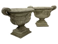 Pair of Classical design composite stone handled oval urn planter