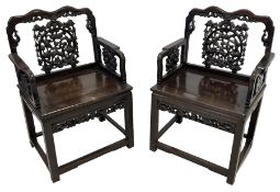 Pair of early 20th century Chinese carved hardwood armchairs