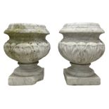 Pair of 19th century weathered white marble urns