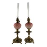Pair of late Victorian ornate brass candlesticks by William Tonks