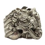 Modern solid silver model of a coiled Dragon