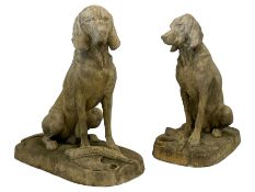 Two composite stone life-size hound garden figures