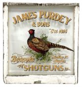 White painted window with hand painted advertising "Purdey and Sons