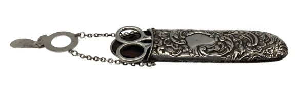 Embossed silver chatelaine case Birmingham 1902 and a pair of silver handled scissors (2)