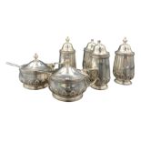 Silver circular double condiment set with lappet bases comprising pair of salts
