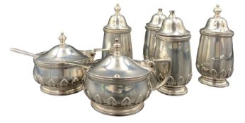 Silver circular double condiment set with lappet bases comprising pair of salts