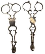 Two pairs of early 19th century silver scissor action sugar nips