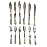 Set of six Edwardian fish knives and forks with engraved silver blades and mother of pearl handles S