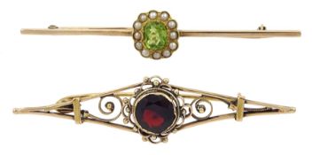 Early 20th century 9ct gold peridot and split pearl bar brooch and an 18ct gold garnet openwork broo