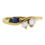 18ct gold three stone marquise cut sapphire and round brilliant cut diamond ring