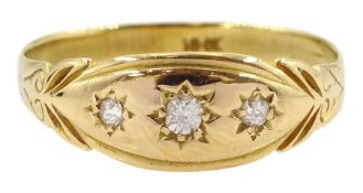 Early 20th century gold gypsy set three stone diamond ring