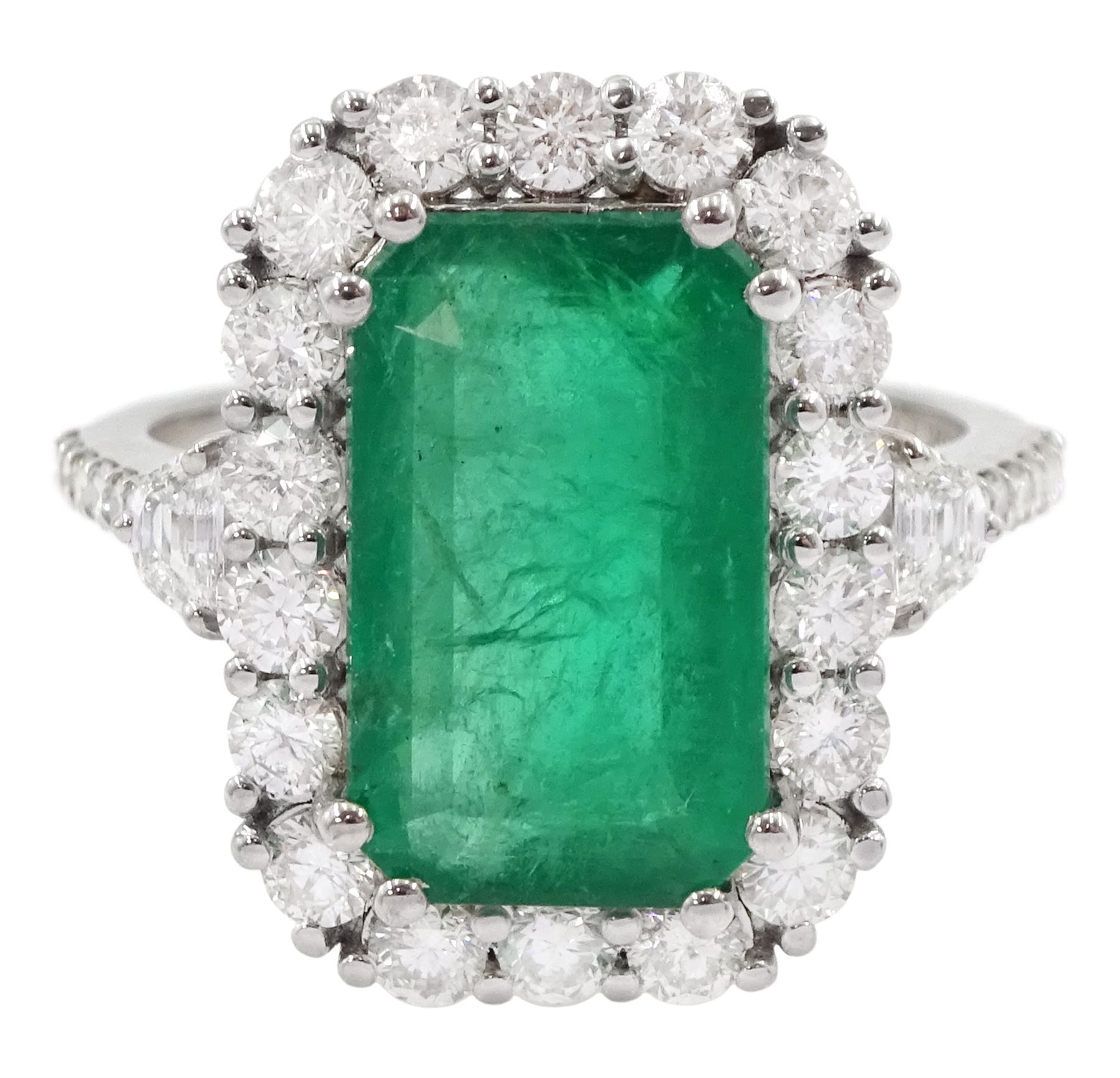 18ct white gold emerald and round brilliant cut diamond cluster ring