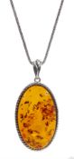 Silver Baltic amber oval pendant necklace