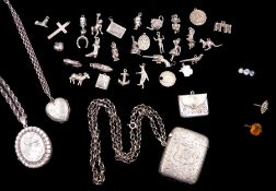 Silver charms including punch