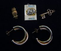 Pair of gold hoop earrings and three gold pendant/charms including owl