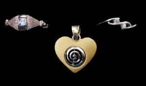 Two 14ct white gold stone set rings and a 14ct yellow and white gold heart pendant